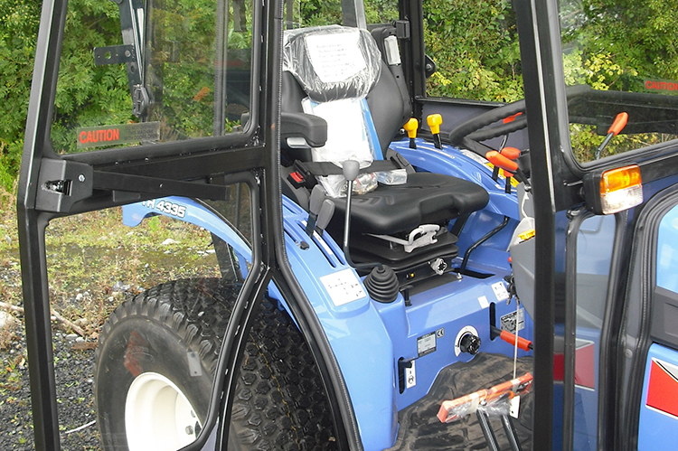 农用机械驾驶室开门支撑与缓冲